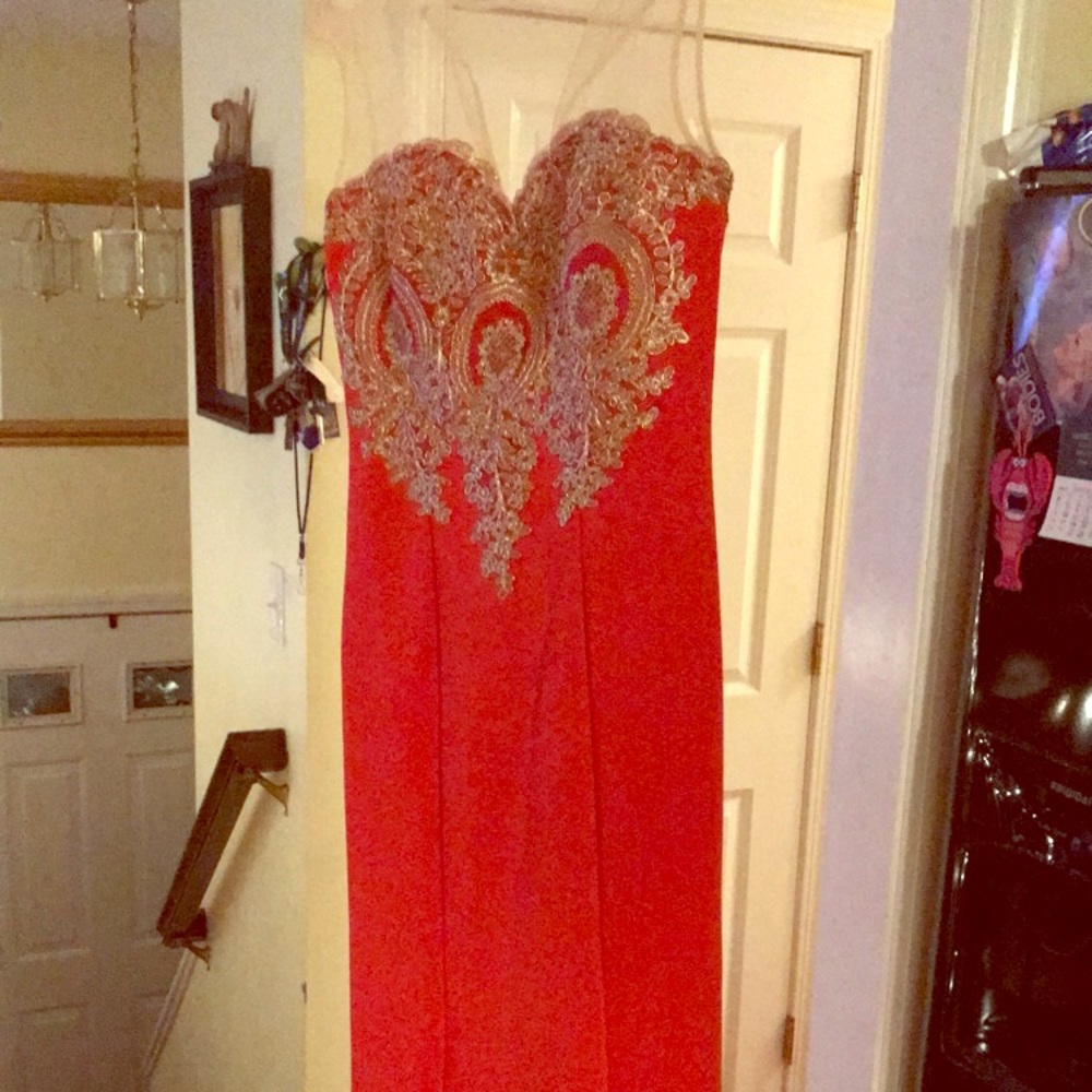 Red gown. Form fitting and a touch of sparkle